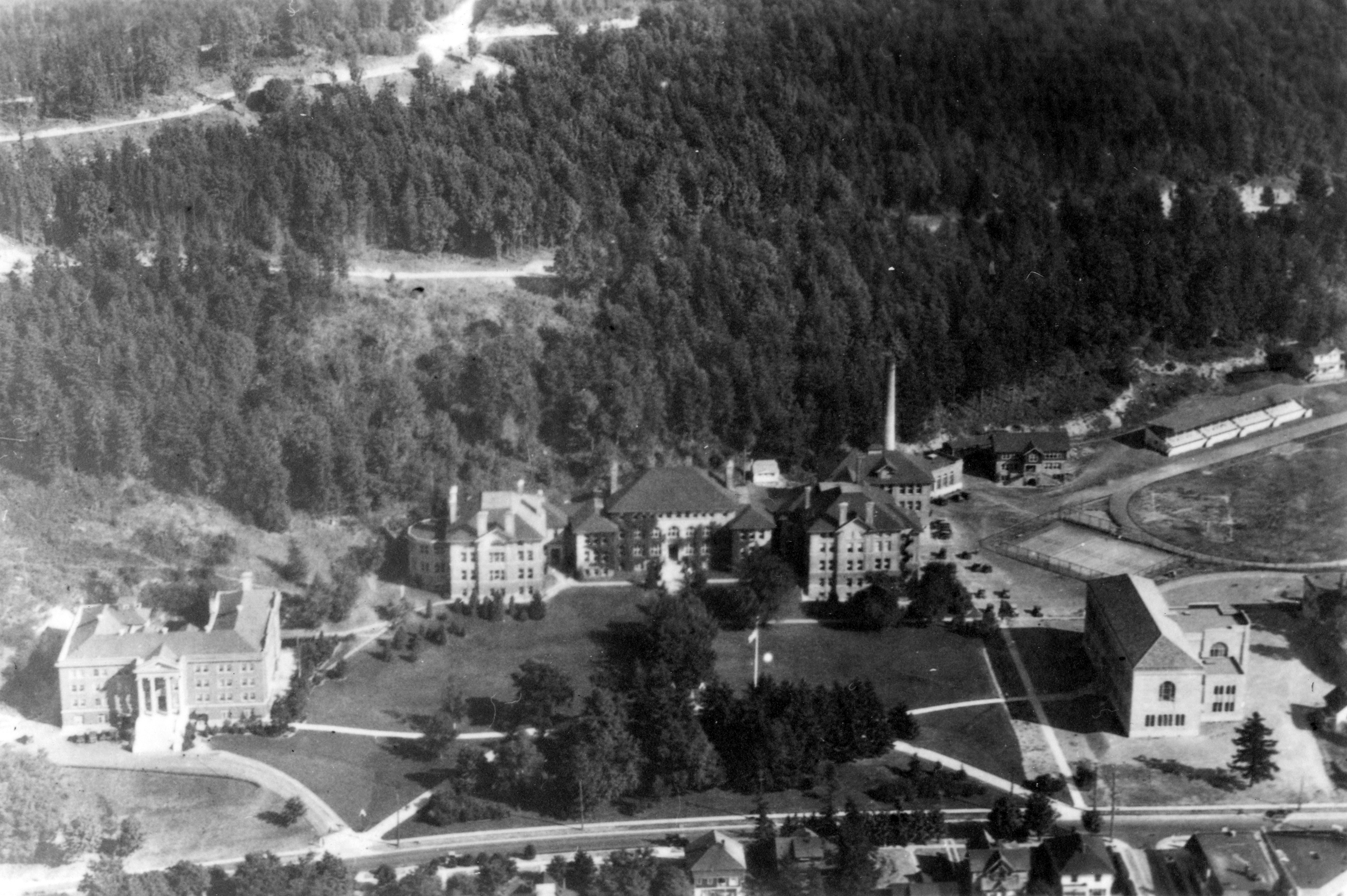 1928 areal photo of campus, showing Edens Hall, Old Main and Wilson Library 