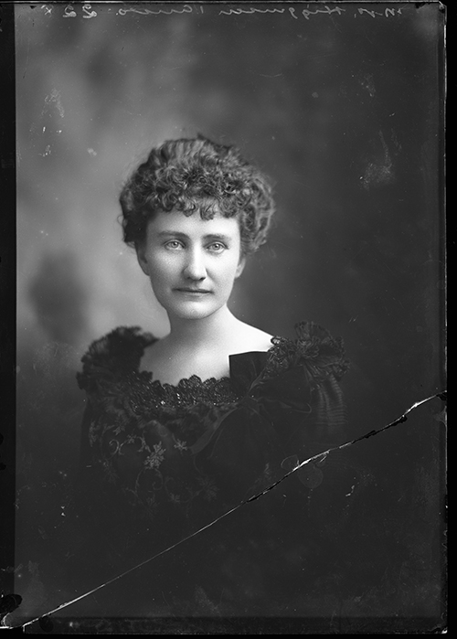 a black and white photograph portrait of a woman from the late 19th century