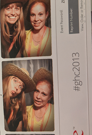 detail of a photo booth strip of two women smiling and making funny faces