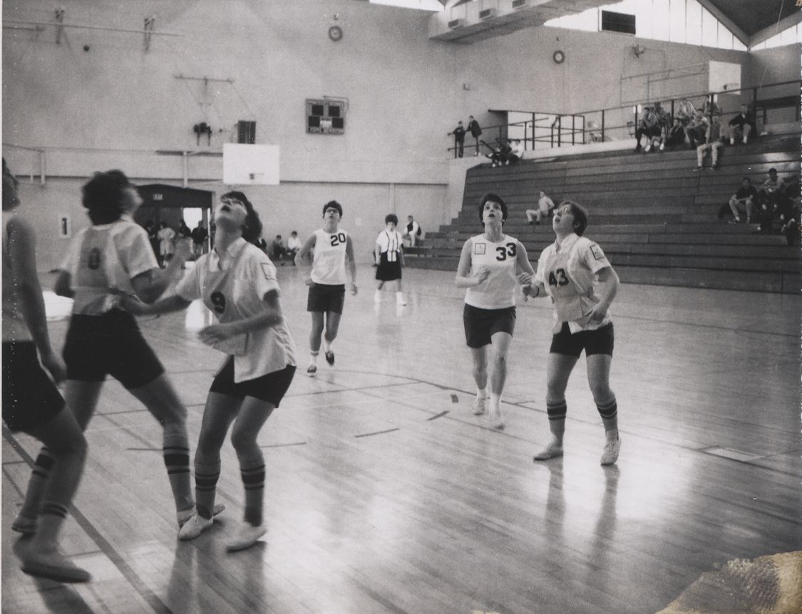 women playing basketball in Carver gym in 1967