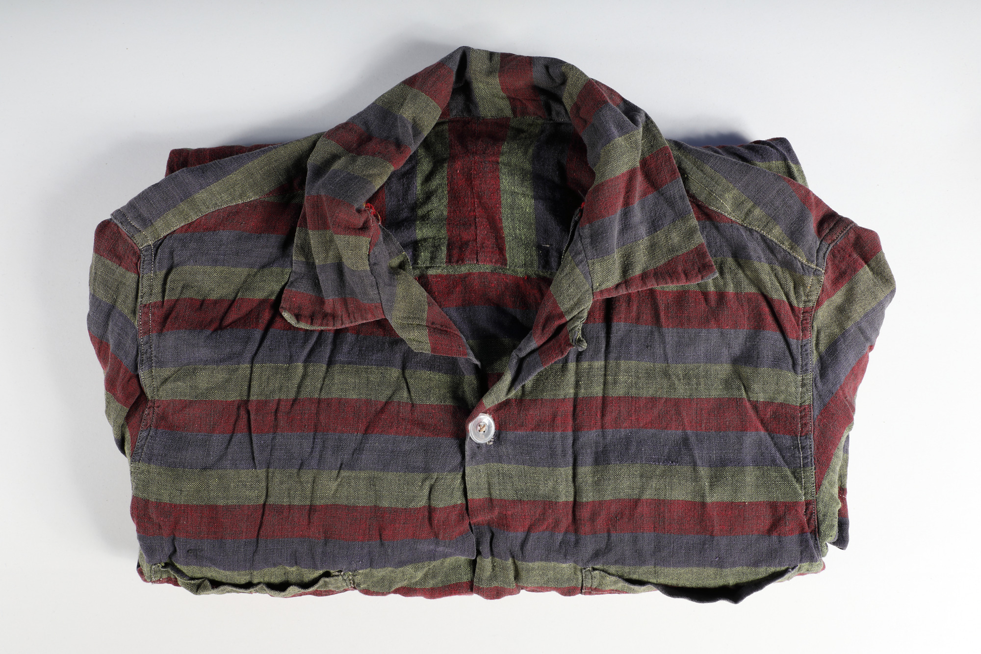 a neatly folded striped shirt