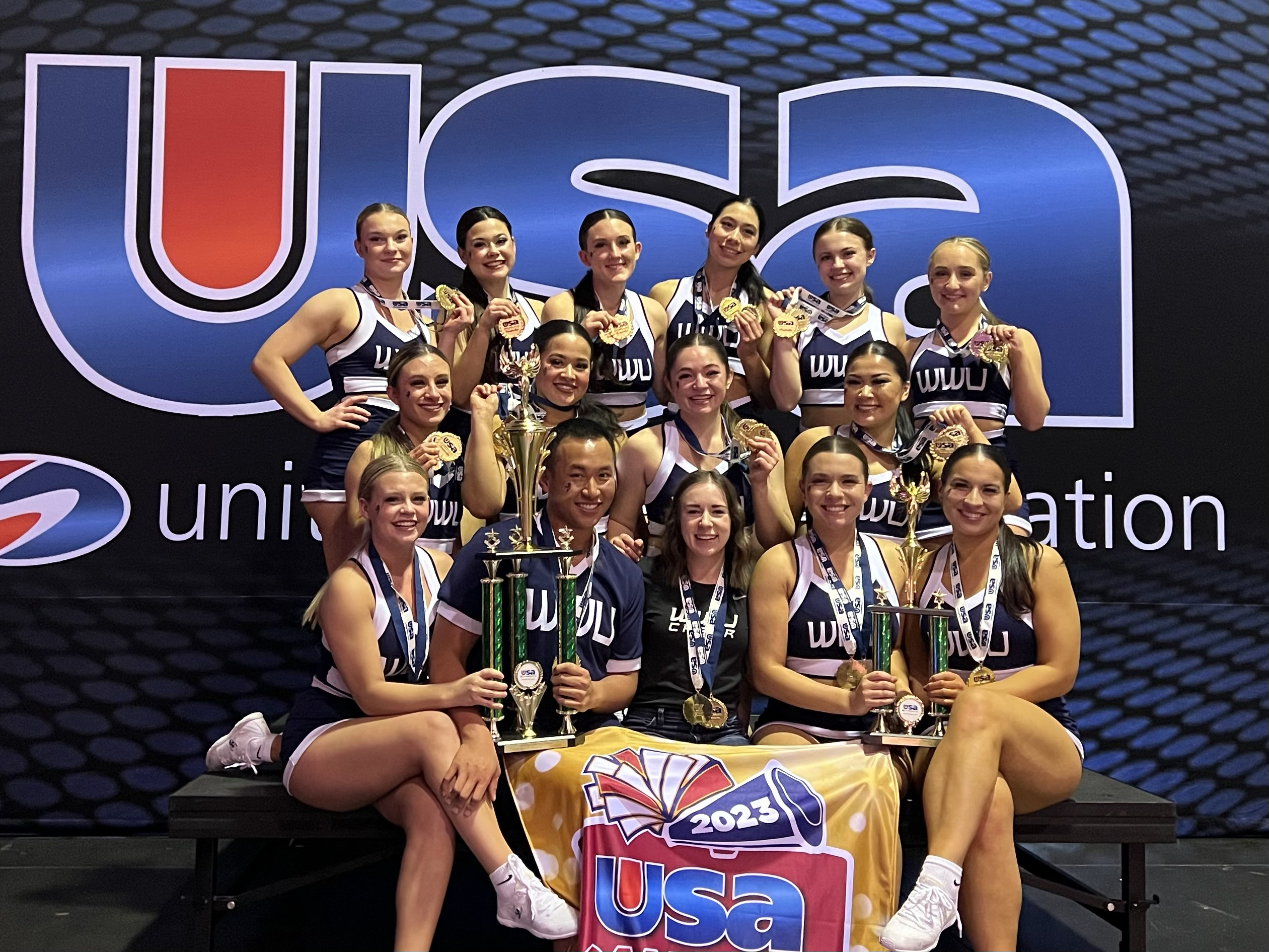 The WWU Cheer Team poses with their trophies from the National Championships
