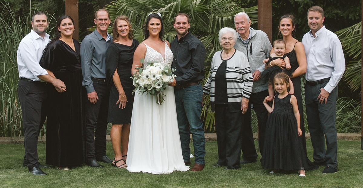 multigeneration family portrait taken at a wedding