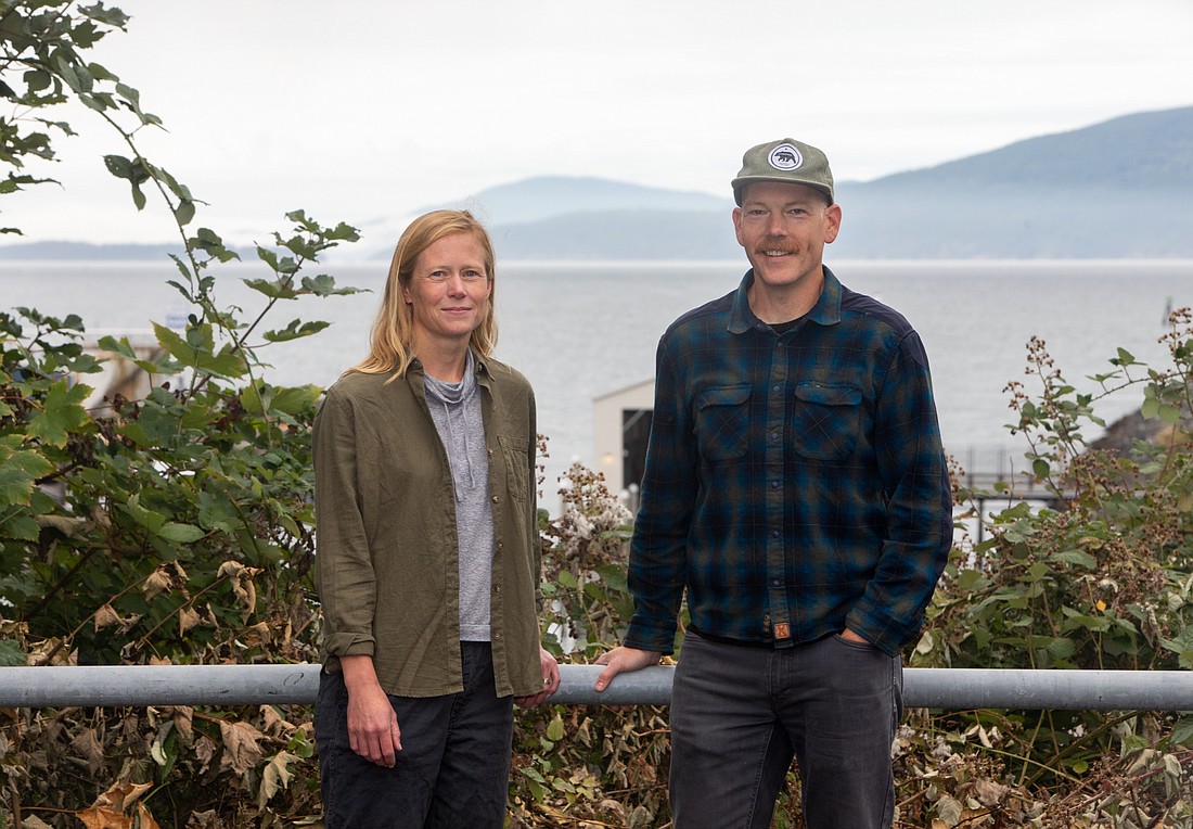 Emily Roland and Colin Amos, with Bellingham Bay and the San Juans in the background