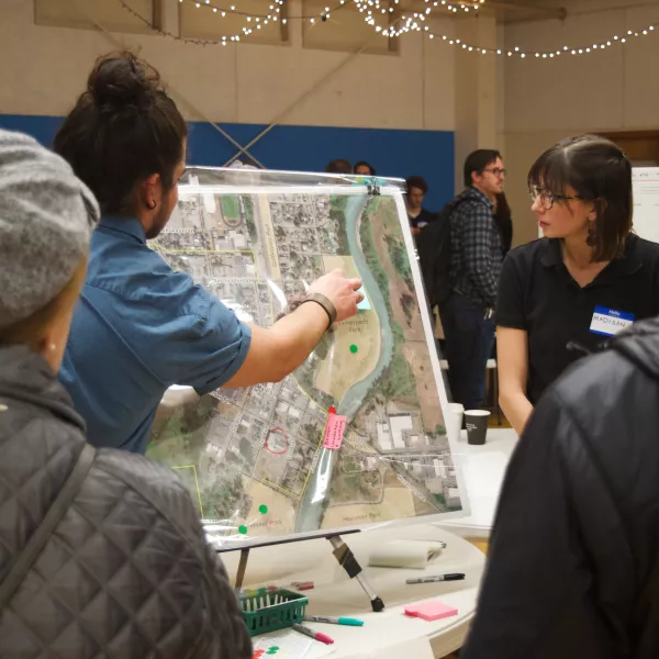 A student points to a map while Ferndale residents watch