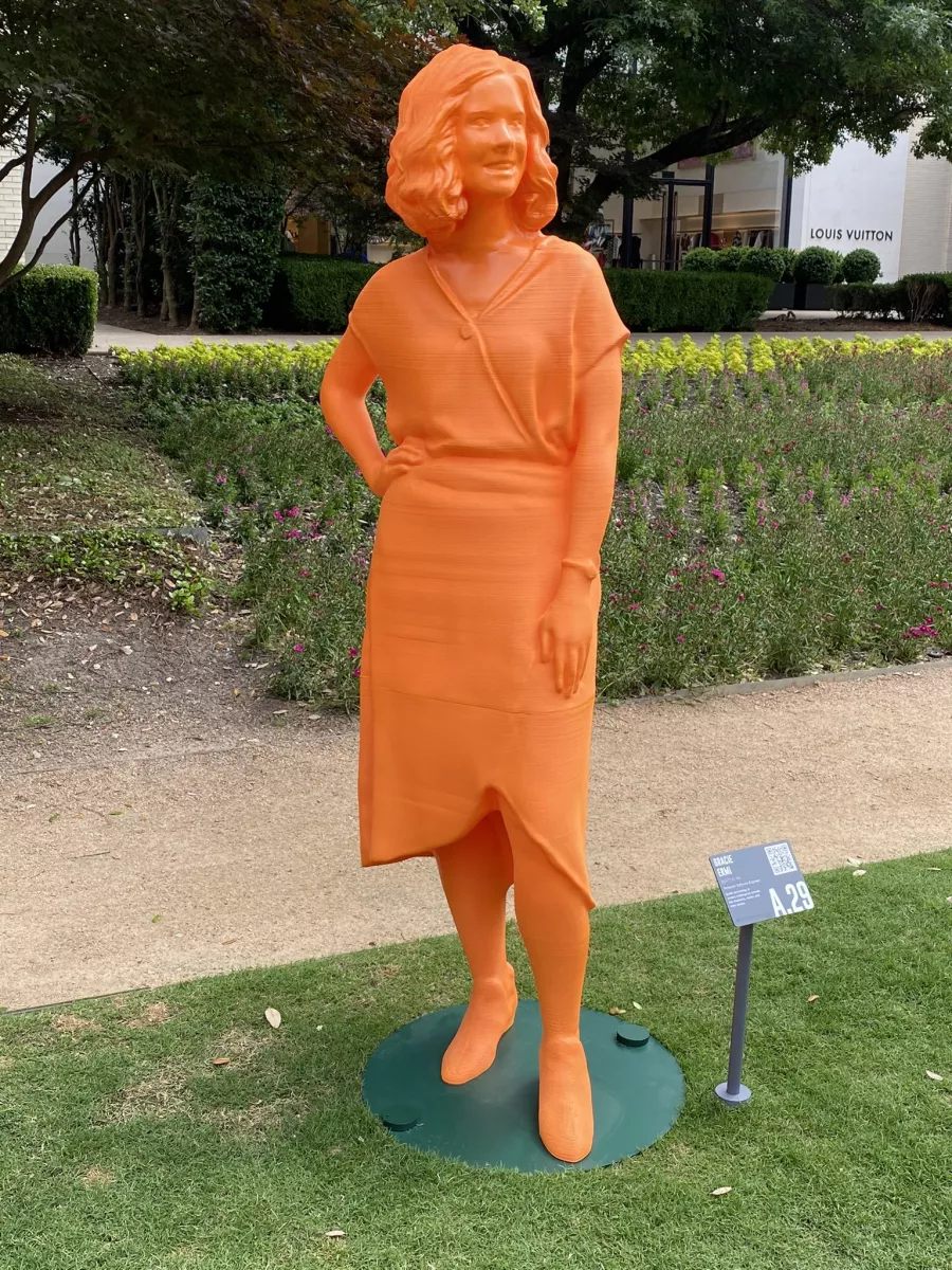 an orange statue of Gracie Ermi