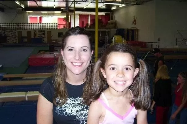 Casey, about four, with her mother in a gymnastics studio. 