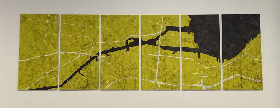 the straight channel of the Duwamish River slashes through a yellow landscape