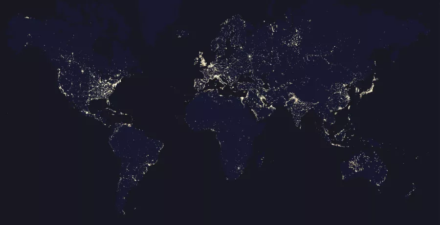 pinpoints of light on a satellite image of the earth at night