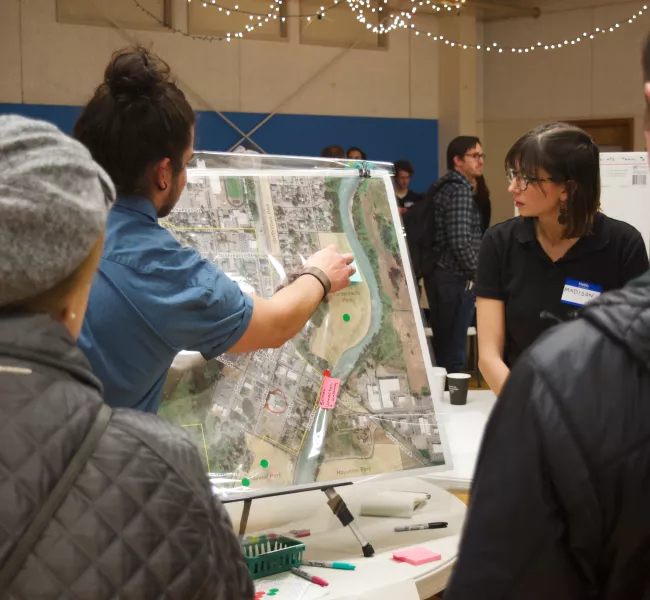 A student points to a map while Ferndale residents watch
