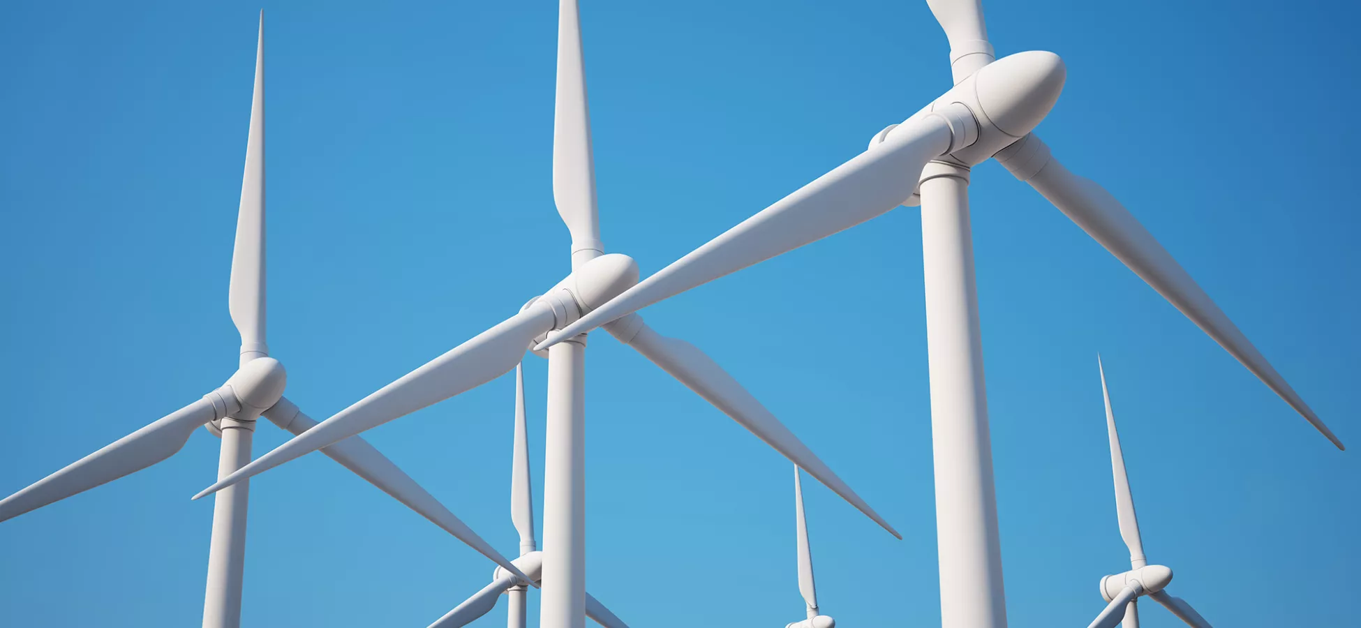 detail of six wind turbines standing in formation