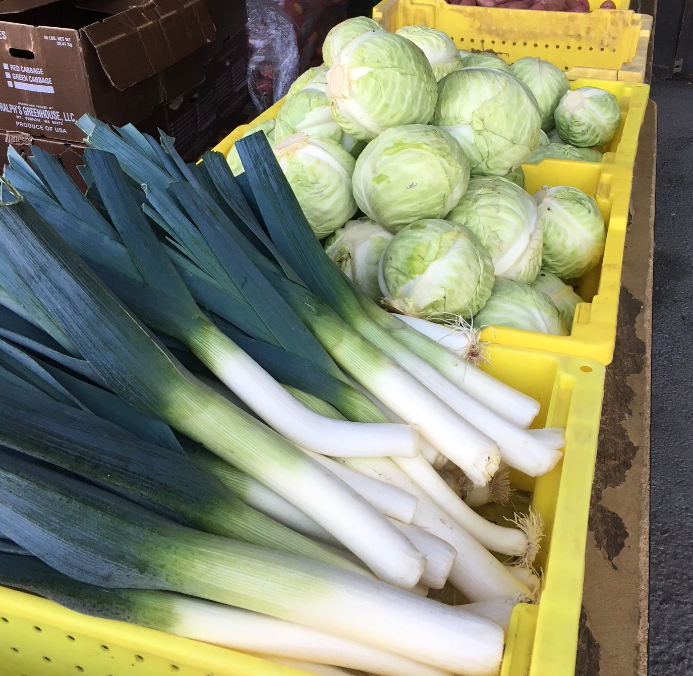 crates of leeks and cabbage 